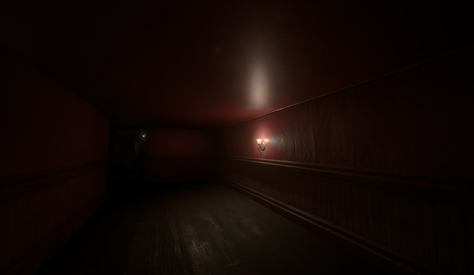 Red-lit corridor inside the residence