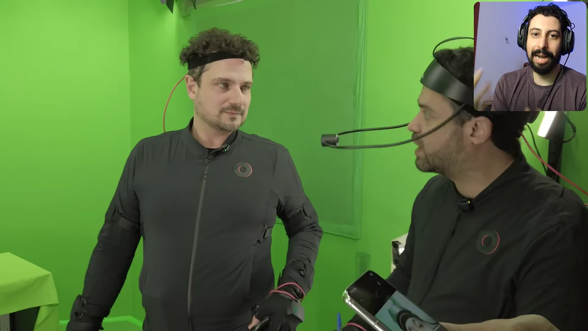 Atores com roupas de captura de movimentos e capacete de câmera facial em estúdio verde